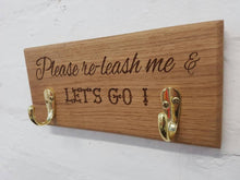 Load image into Gallery viewer, Oak Pet leash hooks with engraved inscription.